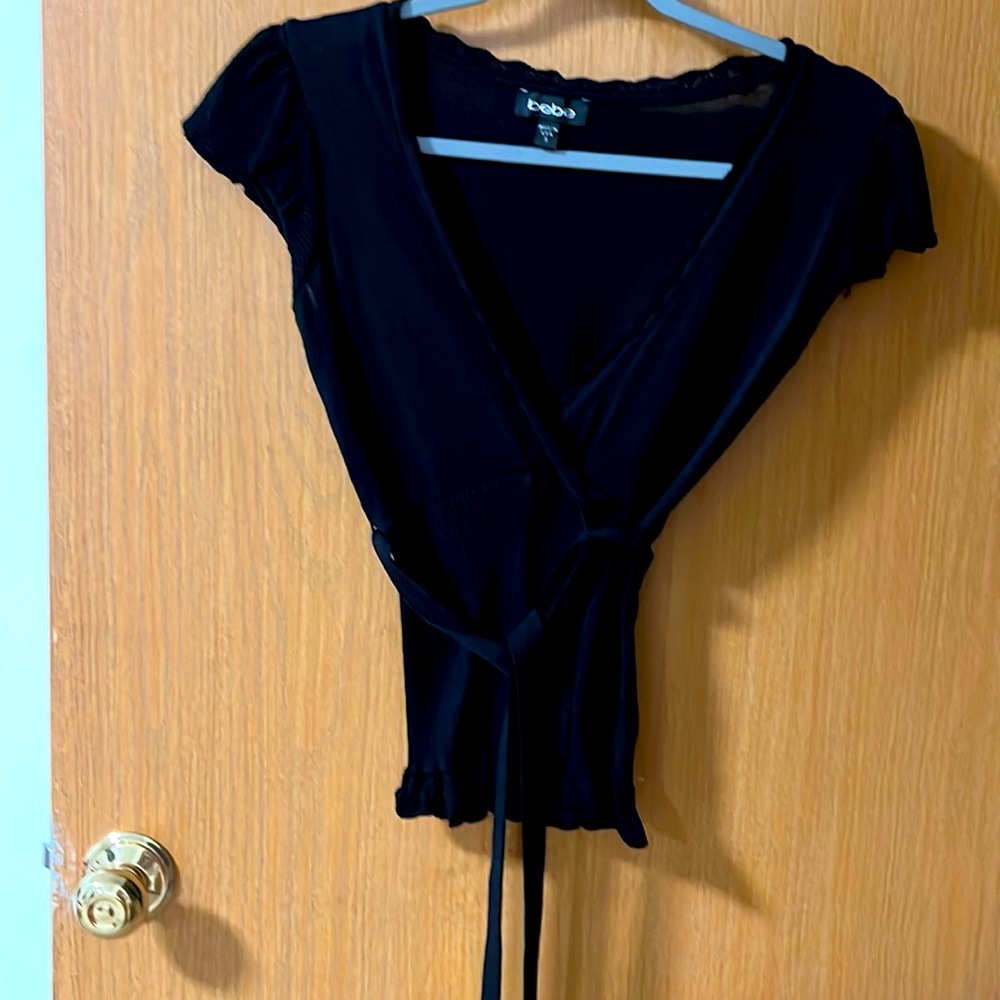A Bebe top, black color size S